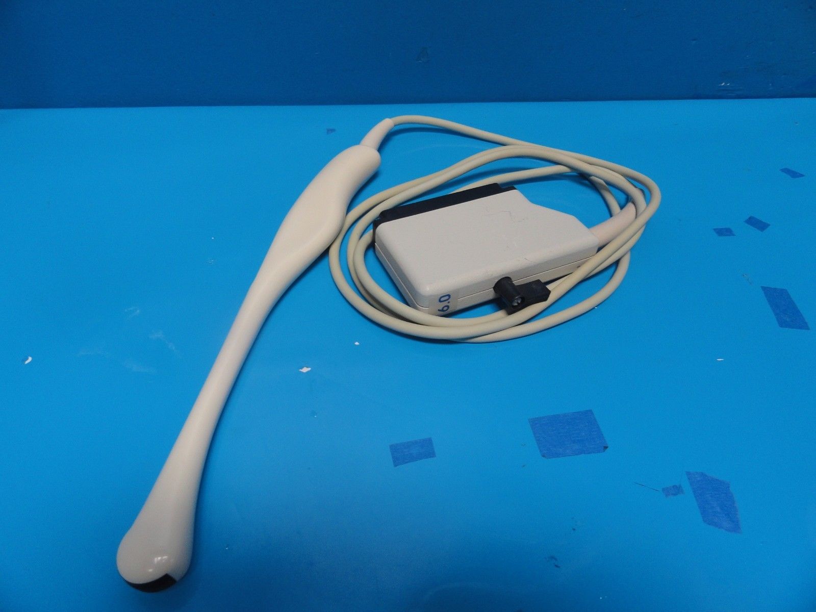 probe wide shot blue backdrop