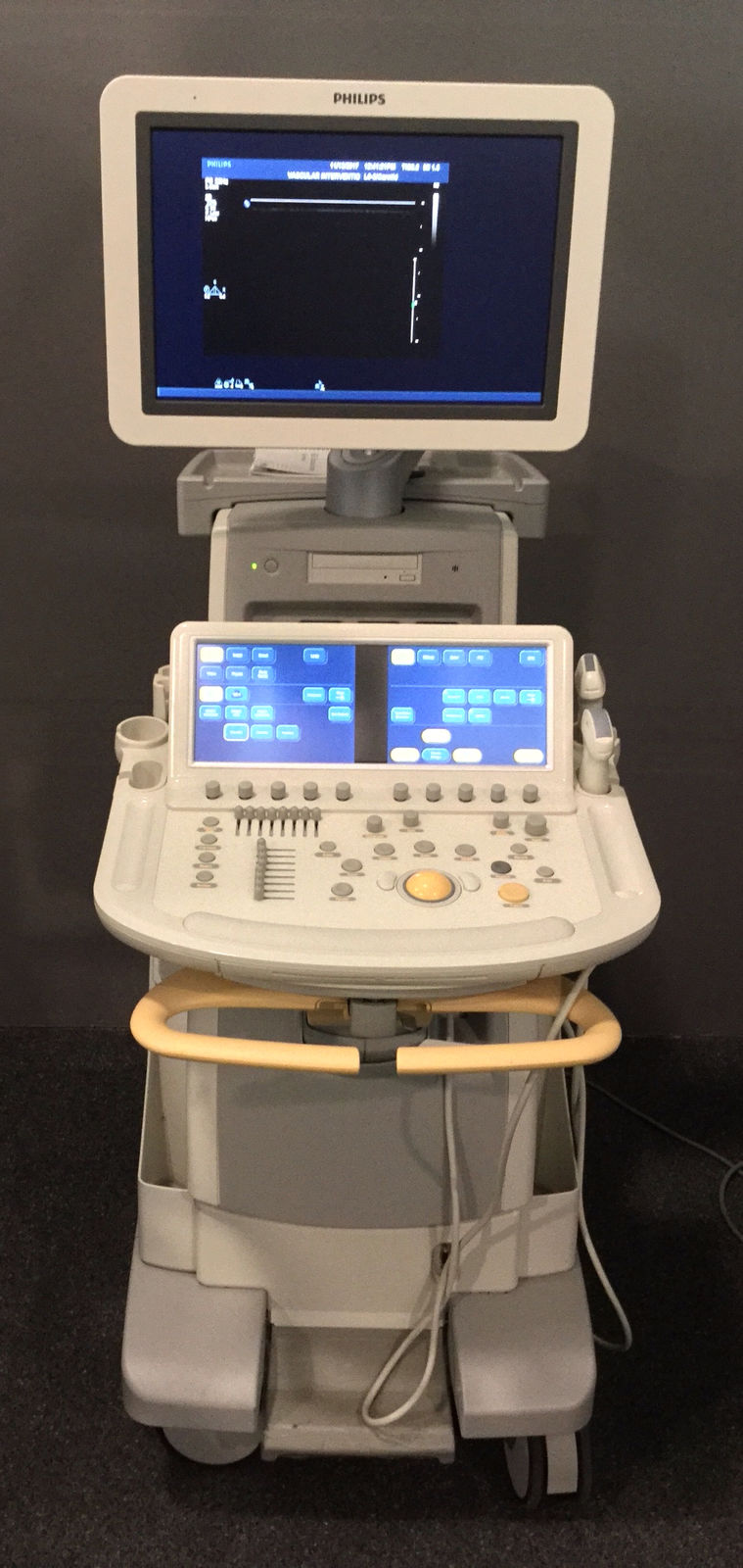 a medical machine with a monitor on top of it