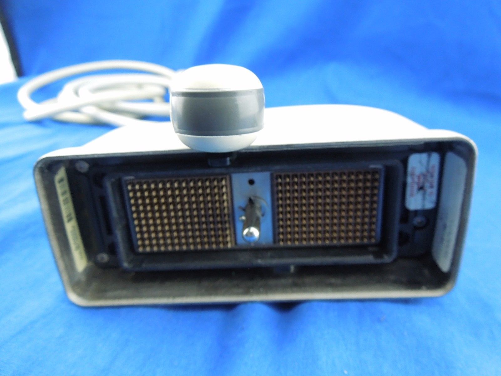 probe connector with head on top blue backdrop