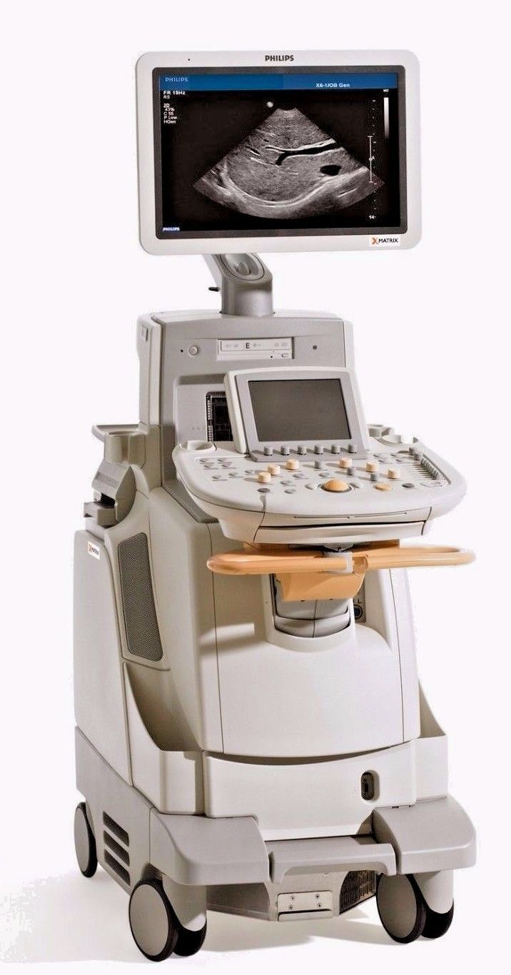 a medical machine with a monitor on top of it