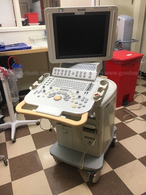 a computer monitor sitting on top of a table