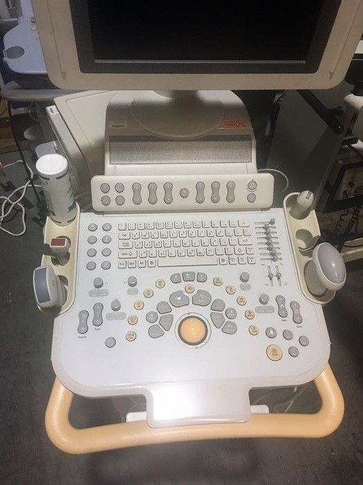 a computer sitting on top of a desk