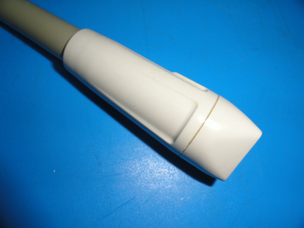 a close up of a pribe on a blue surface