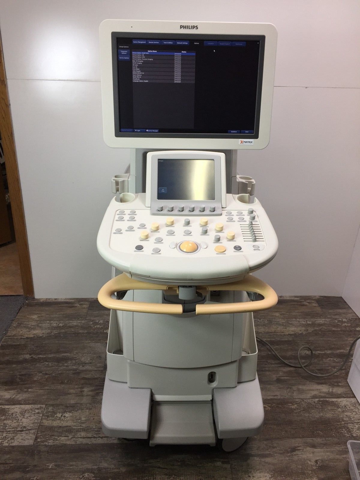 a medical machine with a monitor on top of it